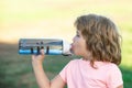 Stay hydrated. Child with bottle of water.