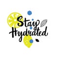 Stay hydrated. Hand lettering with illustration of lemon.