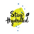 Stay hydrated. Hand lettering with illustration of lemon.