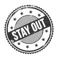 STAY OUT text written on black grungy round stamp Royalty Free Stock Photo