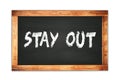 STAY  OUT text written on wooden frame school blackboard Royalty Free Stock Photo