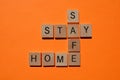 Stay Safe, Home, crossword on orange Royalty Free Stock Photo