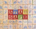 Stay Safe message made from wooden blocks