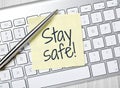Stay safe message on post-it Royalty Free Stock Photo