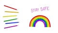 Stay safe message with a rainbow and colored pencils