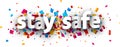 Stay safe sign over confetti background