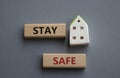 Stay Safe symbol. Concept word Stay Safe on wooden blocks. Beautiful grey background. Business and Stay Safe concept. Copy space Royalty Free Stock Photo