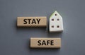 Stay Safe symbol. Concept word Stay Safe on wooden blocks. Beautiful grey background. Business and Stay Safe concept. Copy space Royalty Free Stock Photo