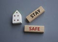 Stay Safe symbol. Concept word Stay Safe on wooden blocks. Beautiful grey background. Business and Stay Safe concept. Copy space Royalty Free Stock Photo