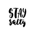 Stay salty - hand drawn lettering quote on the white background. Fun brush ink inscription for photo overlays