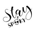 Stay spooky - black lettering with doodle scull, vector illustration isolated on white background