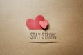 Stay Strong message with small hearts
