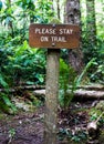 Stay on Trail sign in Redwood national forest hiking trail