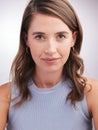 Stay true to who you are. Studio portrait of a confident young woman posing against a grey background. Royalty Free Stock Photo