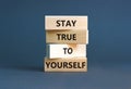 Stay true to yourself symbol. Concept word Stay true to yourself on beautiful wooden block. Beautiful grey table grey background. Royalty Free Stock Photo