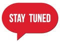 STAY  TUNED text written in a red speech bubble Royalty Free Stock Photo