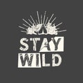 Stay wild. Grunge vintage phrase. Typography, t-shirt graphics, print, poster, banner, slogan, flyer, postcard