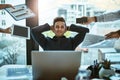 Staying calm and collected throughout the workday. a young businessman looking calm in a demanding office environment.