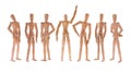 Staying in different poses wooden dummies set isolated with clipping path Royalty Free Stock Photo