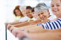 Staying happy and healthy. Shot of a group of women working out indoors. Royalty Free Stock Photo