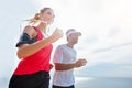 Staying one step ahead. a young couple going for a run together.