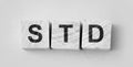 STD Sexually transmitted infections text on wooden cubes. Healthcare concept Royalty Free Stock Photo