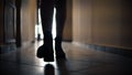 silhouette of legs of woman in boots running