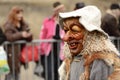Steady smile of woodland mask at Carnival parade, Stuttgart