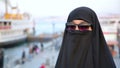 Steadycam - Woman with chador, hijab wearing sunglasses, istanbul