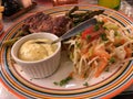 Steak with aspargus, mixed sallad and bernaise sause on colorful plate Royalty Free Stock Photo