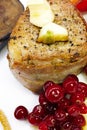 Steak in bacon with cranberry, pepper, honey and garlic. Royalty Free Stock Photo