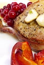 Steak in bacon with cranberry, pepper, honey and garlic. Royalty Free Stock Photo