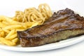 Steak, chips and onion rings Royalty Free Stock Photo