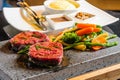 Steak cooked on lava-stone Royalty Free Stock Photo