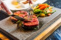 Steak cooked on lava-stone Royalty Free Stock Photo