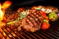 Steak cooking on fire with vegetables Royalty Free Stock Photo