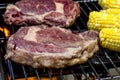 Steak and Corn on Hot Grill Royalty Free Stock Photo