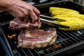 Steak and Corn on Hot Grill Royalty Free Stock Photo