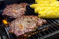 Steak and Corn on Hot Grill Royalty Free Stock Photo