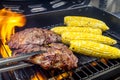 Steak and Corn on Hot Grill Royalty Free Stock Photo