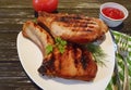 Steak pork fried prepared baked ketchup tomato on a wooden background Royalty Free Stock Photo