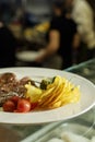 Steak, fried potatoes, tomatoes and green pepper Royalty Free Stock Photo