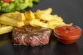 Steak with fries Royalty Free Stock Photo