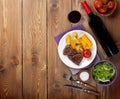 Steak with grilled potato, corn, salad and red wine Royalty Free Stock Photo