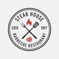 Steak house, barbecue logo. Circle, round logo of bbq. Vintage emblem for restaurant, barbecue. Trendy simple design. Vector illus Royalty Free Stock Photo