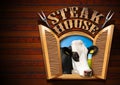 Steak House - Window with Cow Royalty Free Stock Photo