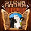 Steak House - Window with Cow Royalty Free Stock Photo