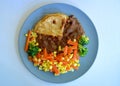 Steak and kidney pie vegetables on a plate. Royalty Free Stock Photo
