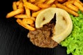 Steak And Kidney Pudding And Chips Meal Royalty Free Stock Photo