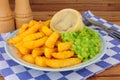 Steak And Kidney Pudding Meal With Chips And Mushy Peas Royalty Free Stock Photo